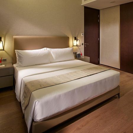 I'M Hotel Makati City Exteriér fotografie A bedroom at the hotel